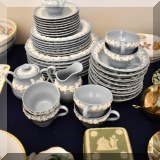 P08. Blue Wedgwood Queen's Ware china set. 40 pieces including cream and sugar.